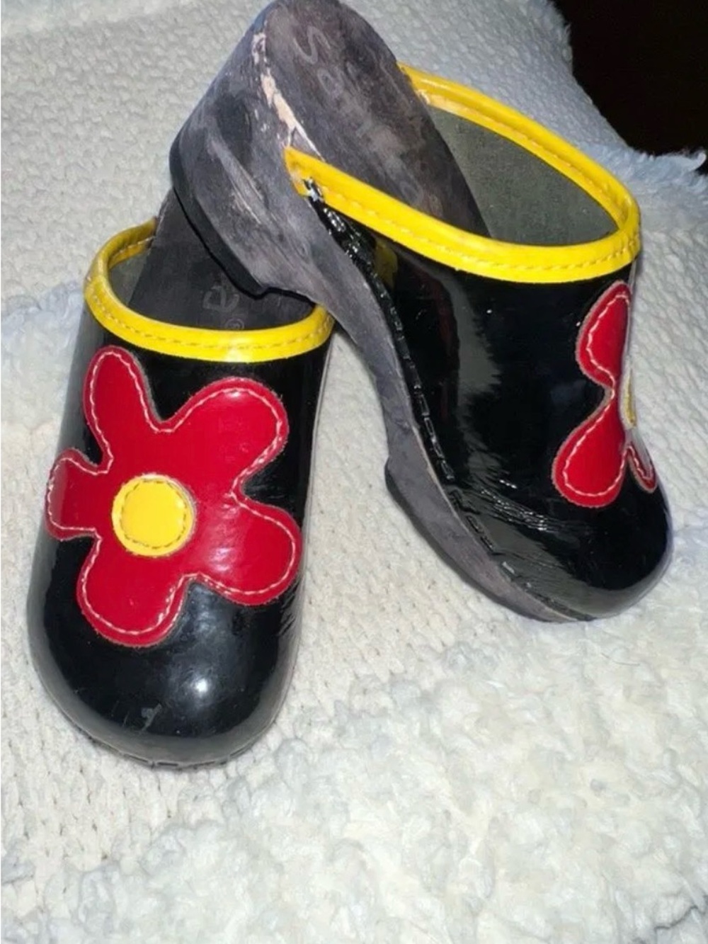 Sanita Black Patent Clogs with Red Flower and Yellow Trim